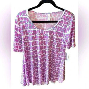 Lularoe Medium white,  pink , & blue Perfect T. NWT. This top says gender reveal
